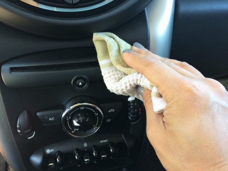 Use vinegar to clean tough to reach crevices in your dashboard and cup holders.