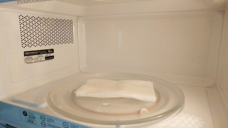 Quick Kitchen Cleaning Hacks - Clean Microwave with Damp Paper Towels
